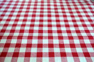 Red Checkered Tablecloth Texture Background. photo