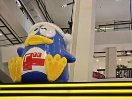 BANGKOK, THAILAND AUGUST 09, 2023 Donpen mascot of Don Don Donki where is a Japanese multinational discount store chain that was founded in september 5, 1980. photo
