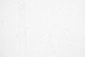 Weathered Adhesive Tape on White Concrete Wall Background. photo