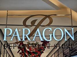 BANGKOK, THAILAND  DECEMBER 21, 2023 Paragon sign. Siam Paragon is a famous department store in Bangkok. It is a One of the biggest shopping centres in Asia, it opened on December 9, 2005. photo