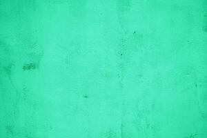 Abstract Neo Mint Color on Grunge Concrete Wall Texture Background that the one of 2020 Color Trends. photo