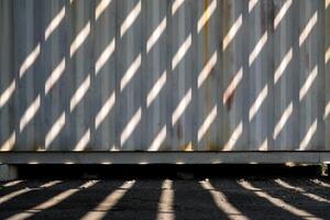 Light Beam on Surface of Metal Container Background. photo