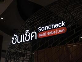 BANGKOK, THAILAND JULY 19, 2023 Sancheck Sign. Sancheck is No.1 Korean roll and nabe restaurant in Bangkok that is located on the 6th floor at ICONSIAM. photo