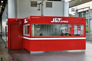 BANGKOK, THAILAND AUGUST 12, 2023 J and T express Service Booth. J and T is an international delivery company in Thailand that was founded in August 2015 in Jakarta, Indonesia. photo