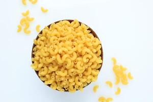 Top View Raw Dried Macaroni Pasta in A Bowl photo