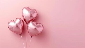 AI generated Pink heart shaped helium balloons on pink background. Foil air balloons on pastel pink background. 3 Pink hearts with space for text. photo