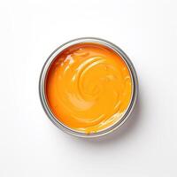 AI generated Open tin can of yellow and orange paint isolated on white background. Top view. Shades of yellow and orange paints in one jar. photo