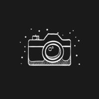 Camera icon in doodle sketch lines. Digital photography snapshot vector