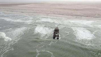 drone view Shipwreck off the coast of Africa. Rusty Ship video