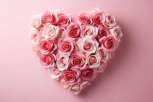 AI generated heart made of fresh gentle pink roses flowers on pink background top view, valentines day design card photo