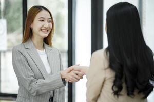 Accepting a business proposal with a handshake. photo