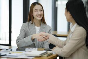 Accepting a business proposal with a handshake. photo