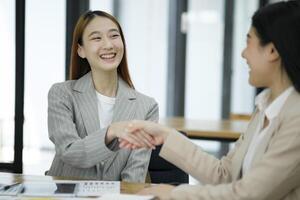 Accepting a business proposal with a handshake. photo