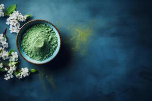 AI generated Matcha tea powder on dark blue background with copy space. AI generated. photo