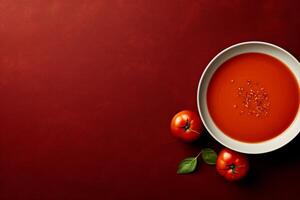 ai generado cuenco de tomate sopa en rojo antecedentes con Fresco Tomates, parte superior vista, Copiar espacio. ai generado. foto