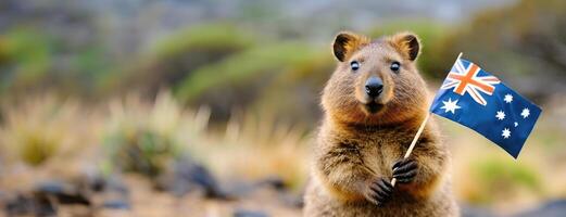 ai generado quokka participación australiano bandera con natural antecedentes un adorable quokka soportes participación el australiano bandera, un símbolo de nacional orgullo en contra un natural fondo. foto