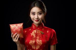 AI generated beautiful woman wearing qipao dress and holding aungpao with generative ai photo