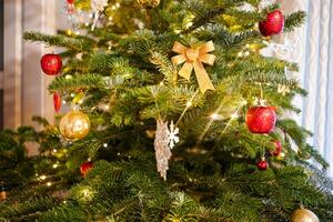 Christmas tree with colorful christmas baubles. Christmas decorations. photo