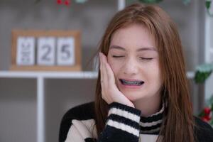 Portrait of Teenage girls with braces on her teeth photo