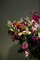 Still life. luxury spring flowers on a black background. color bloom. Low key photo