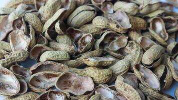 de cerca foto de maní caparazón. textura de maní conchas