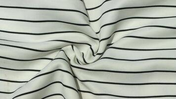 Striped black and white fabric texture. photo