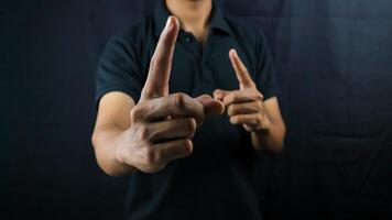 A business man's finger pointing, as if in warning. Businessman gesture angry with his worker. Sign angry. photo