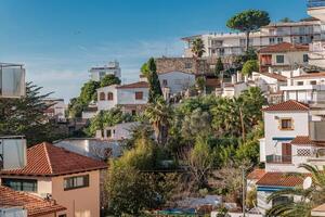 Mediterranean houses on a hill on a sunny clear day photo