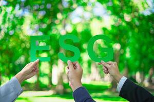 ESG energy-saving cooperation for the Sustainable Development Goals. cooperation, Global community teamwork, and Environmental Day Strong hand group business cooperation success photo