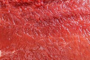 Raw red beef meat macro texture or background photo