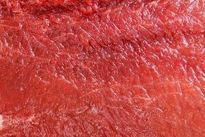 Raw red beef meat macro texture or background photo