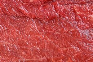 Raw red beef meat macro texture or background photo