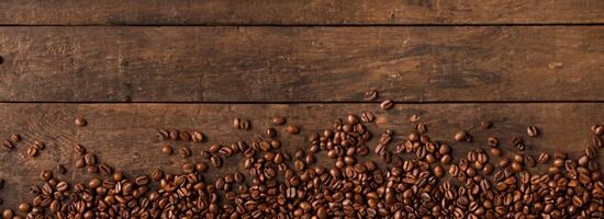 Coffee beans on wooden background with copyspace. photo