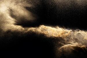 Abstract cloud motion blurred sand background.Sandy explosion isolated on over dark background. photo