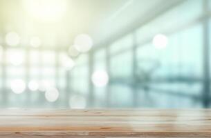 Wooden desk with Blurred of interior office room with city building background photo