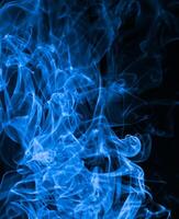 Blue smoke abstract on black background, Toxic gas, darkness concept photo