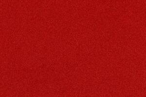red Christmas background with shiny color speckles photo