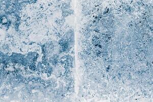Ice blocks surface, blue toned. Ice texture background. Textured cold frosty surface of ice blocks. photo