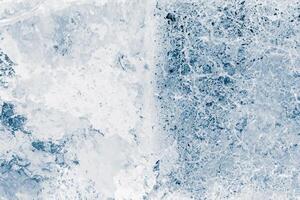Ice blocks surface, blue toned. Ice texture background. Textured cold frosty surface of ice blocks. photo