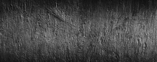 dark black abstract cement concrete wall texture background photo