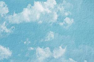 Double exposure of cloud and sky of paper texture for background Abstract,postcard nature art pastel style,soft and blur focus. photo