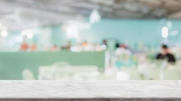 Empty white marble stone table top and blur glass window interior restaurant banner mock up abstract background - can used for display or montage your products. photo