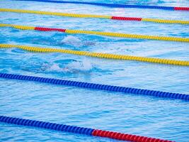 Young man swimmer in the competition. Concept of sport. Space for text photo