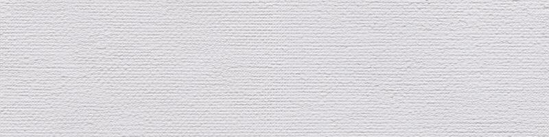 Classic white acrylic canvas background as part of your creative work. Seamless panoramic texture. photo