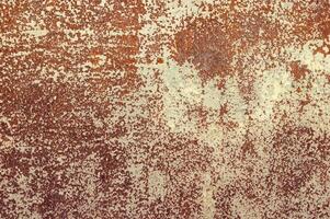 Metal rusty background texture with peeling paint photo