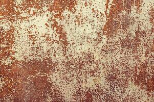 Metal rusty background texture with peeling paint photo