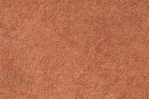 Smooth seamless texture of a terry towel. Sand color photo