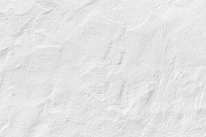white plaster wall in rough structure photo