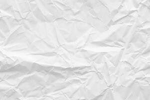 textura de fondo abstracto de papel arrugado blanco foto