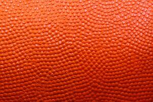 Close-up of orange basketball texture background photo